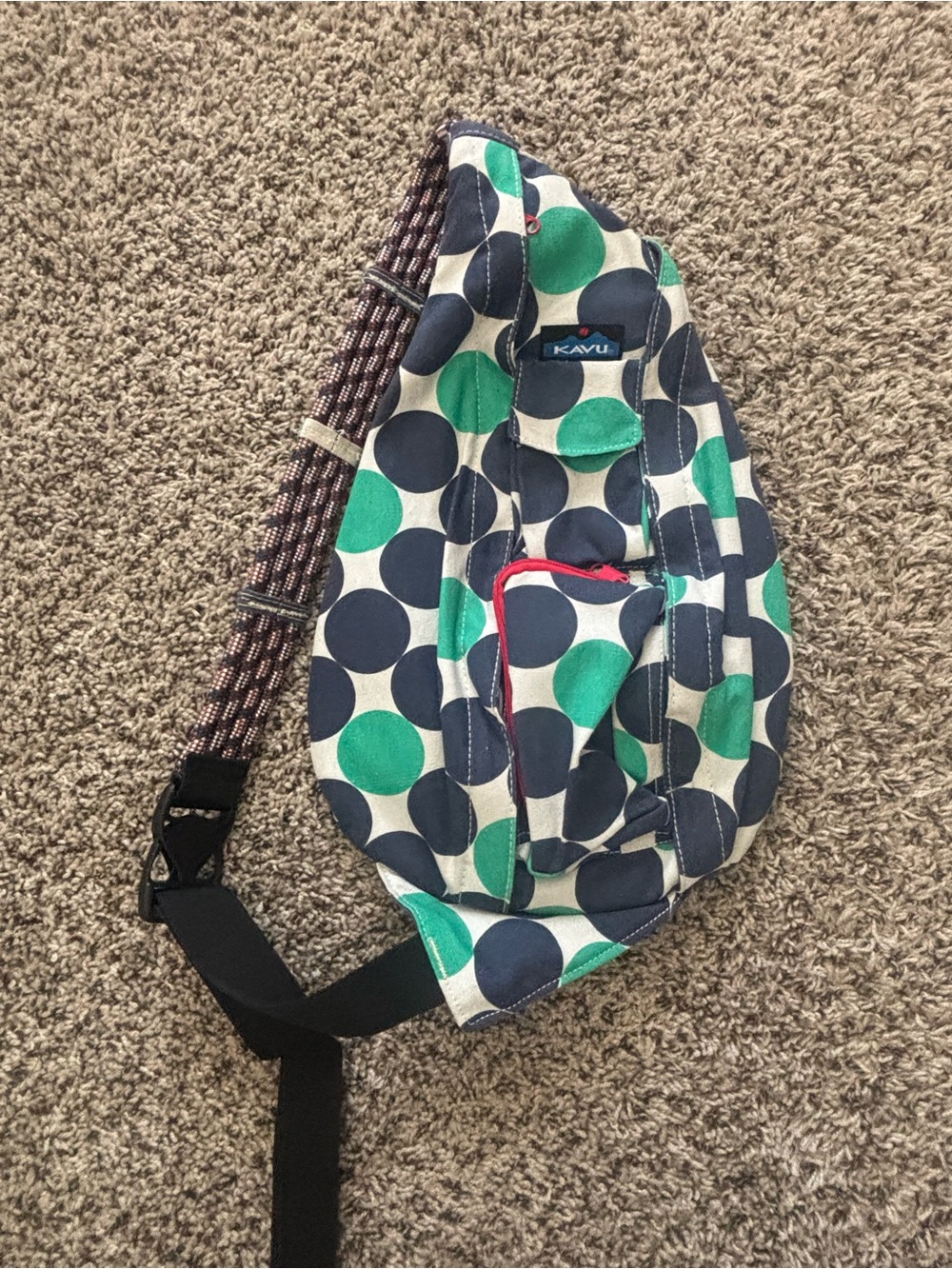 KAVU One-Piece Sling Bag in Navy and Green Dot Print